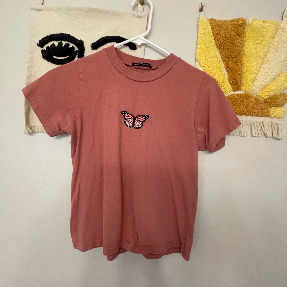 Brandy Melville tee. Size fits like XS/S, condition is like new.